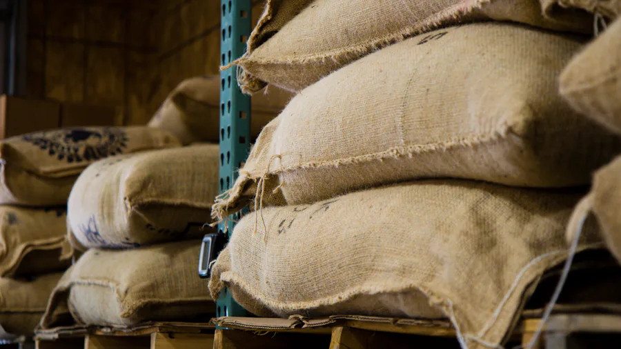 Jute sacks stacked on pallets in a warehouse